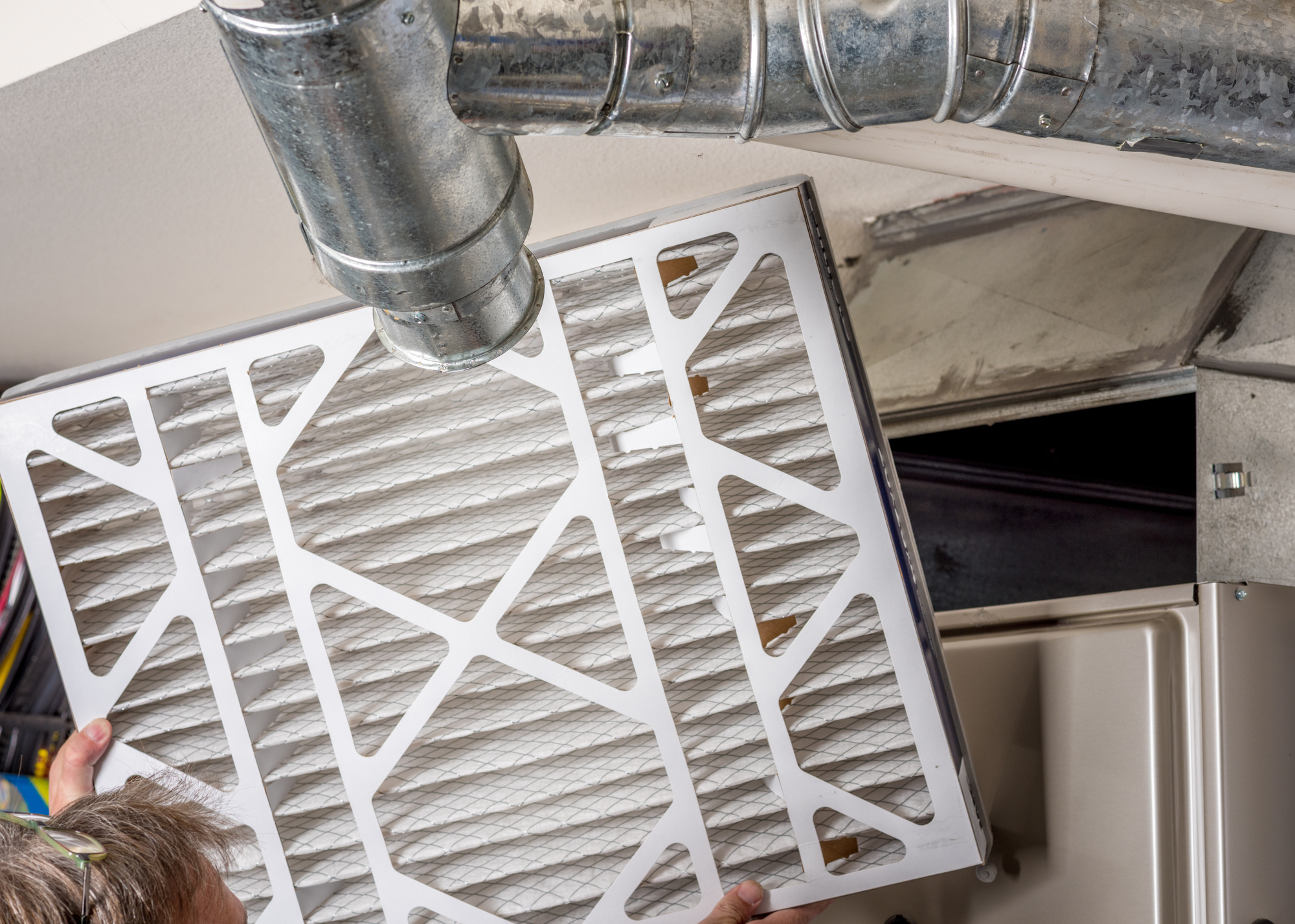 Home Furnace filter inspection for dirt
