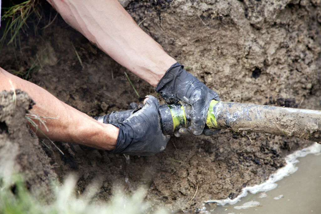 Repairing a broken pipe under foundation